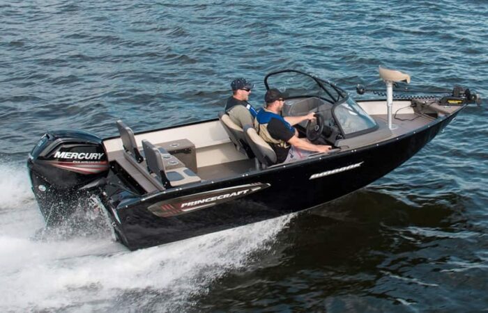 Two people ride in a black Princecraft boat with a Mercury outboard motor, moving quickly across the water.