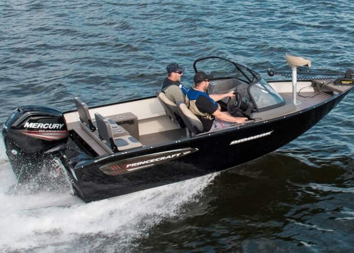 Two people ride in a black Princecraft boat with a Mercury outboard motor, moving quickly across the water.