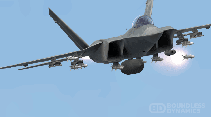 A gray military fighter jet with missiles mounted under its wings flies in a clear blue sky. “Boundless Dynamics” logo is visible in the lower right corner. A gray military fighter jet with missiles mounted under its wings flies in a clear blue sky. "Boundless Dynamics" logo is visible in the lower right corner.