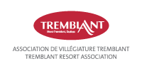 Logo of the Tremblant Resort Association featuring a red oval with "Tremblant" text and smaller text below reading "Mont-Tremblant, Québec" and the full association name underneath.