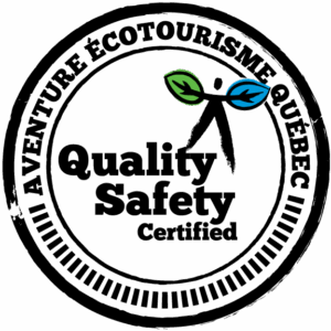 Circular badge with "Aventure Écotourisme Québec" around the edge and "Quality Safety Certified" in the center, featuring a stick figure with green and blue leaf arms.